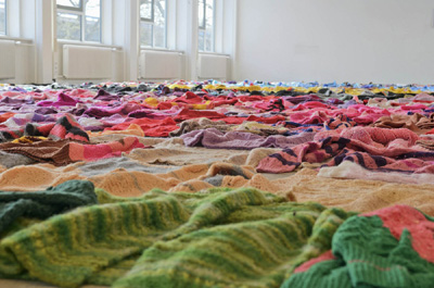 Hundreds of sweaters knitted by Loes Veenstra