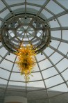 The Dale Chihuly chandelier in the Welcome Center. Movable glass louvers in the dome help manage ventilation.