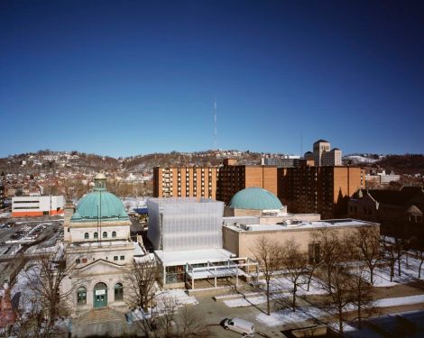 The "lantern" building joins the historic Allegheny Post Office and former Buhl Planetarium. Ned Kahn's 40,000-piece wind sculpture (center) is usually in motion. Koning Eizenberg was the project architect.