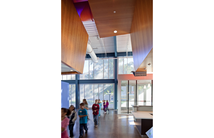 Entry area with fritted, bird-friendly glass. Courtesy of Springboard Design.