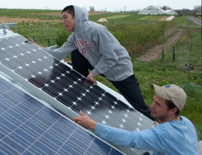 Installing solar panels at Dickinson College's farm. Photo courtesy of Jennifer Crowley.