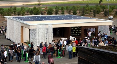 Visitors line up to tour the Team Austria house, built by students from Vienna Institute of Technology, after it came in first place overall at the U.S. Department of Energy Solar Decathlon 2013 at the Orange County Great Park in Irvine, Calif. on October 13, 2013 (Credit: Stefano Paltera/U.S. Department of Energy Solar Decathlon)
