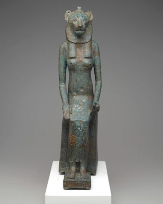 Divine Felines exhibition: Seated wadjet, late Egypt. Collection of the Brooklyn Museum