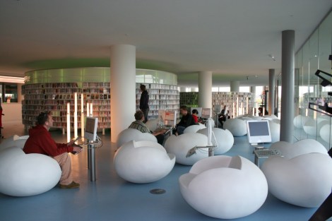 Amsterdam's central public library has fun furniture, 600 terminals, a restaurant and books too! Courtesy of mimoa. 