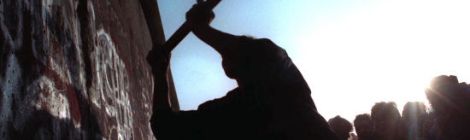 Taking down the Berlin Wall. Courtesy of Huffington Post