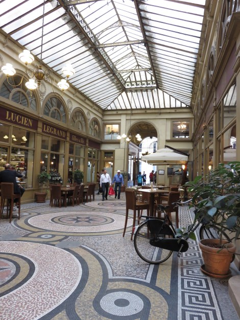 The Galerie Vivienne is one of the early 19th-century shopping arcades, beautifully restored and full of shops (Oct 2014) Bobbie Faul-Zeitler CC- 3.0