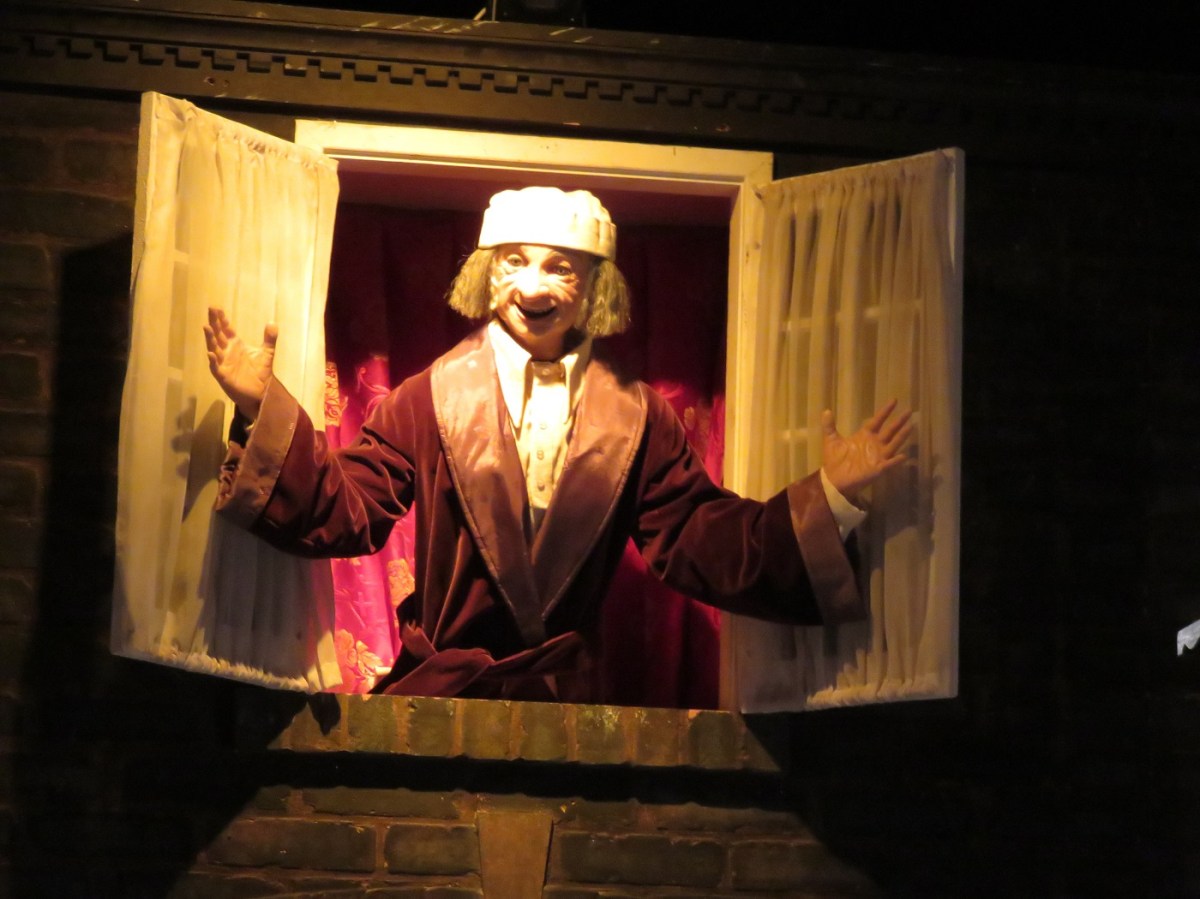 Ebenezer Scrooge is one of dozens of animated figures and sets that tell the story of Charles Dickens's A Christmas Carol. Here's Scrooge on Christmas morning -- he has seen the light! (Bobbie Faul-Zeitler, CC 3.0)