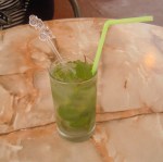 The Mojito, a highball drink still popular in Cuba, is made of white rum, sugar cane juice, lime juice and sparkling water. Essential on the to-do list when you're visiting Cuba. (Photo by Meg Maguire.)
