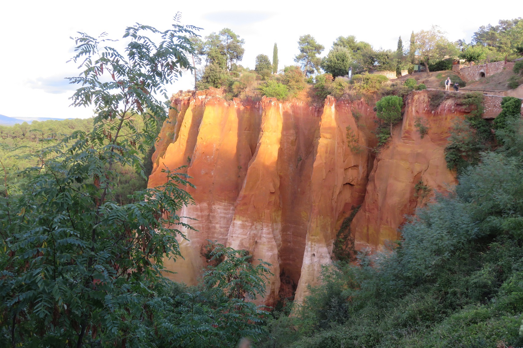 The ocher cliffs in Roussillon France (The Luberon) were the source of pigments used by artists like Rembrandt. The whole town is saturated with different ocher tones in the stucco walls. (Roberta Faul-Zeitler, CC 3.0)