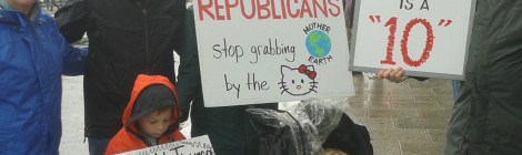 An entire family, all with signs, at the DC March for Science, just outside the National Mall.