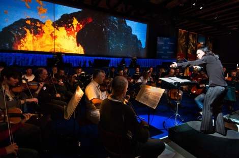 Carolyn Kuan conducts Origins, a symphonic work based on the LIFE project, in Geneva, Switzerland for the official start-up of the Hadron Collider (2009)