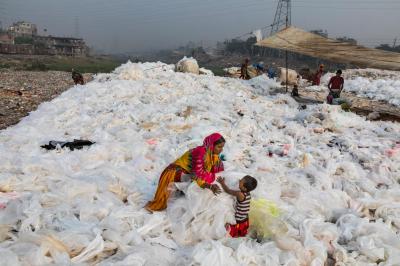 Plastic bags being washed in the Buringanga River, Bangladesh. Photo by Randy Olson, National Geographic.