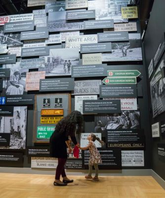 The Wall of Laws in the Mandela exhibition. Laws reinforced institutionalized segregation and lack of human rights. Photo by Jessica Sigurdson/CMHR