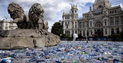 Cibeles Fountain Madrid full of recycled plastic bottles, part of the Plastic Islands Installation in 2017-18.